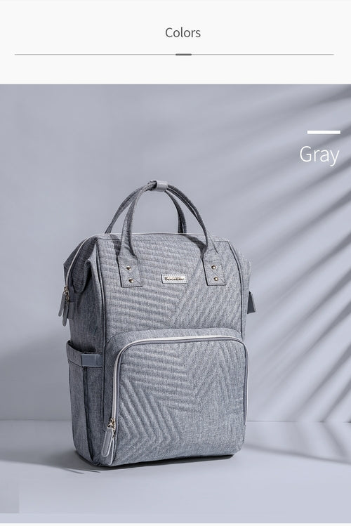 Gray backpack on a light gray background