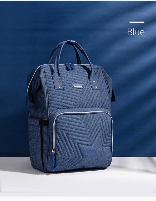 Blue backpack with geometric pattern on a blue background