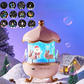 Decorative night light with animated scenes on a snowy landscape