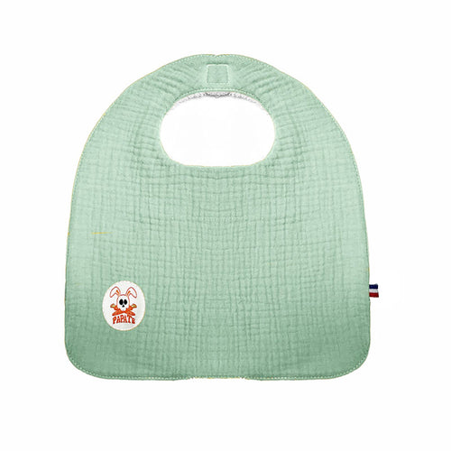 Light green baby bib with a logo on a white background