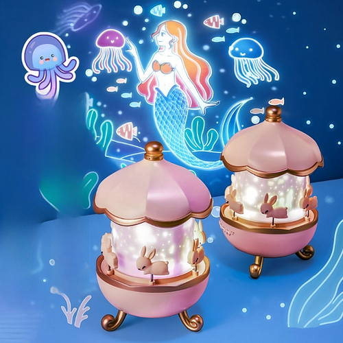 Two pink and gold carousel toys with mermaid illustration on a blue background