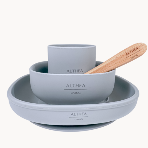 Gray ceramic tableware set with 'Althea' branding on a white background